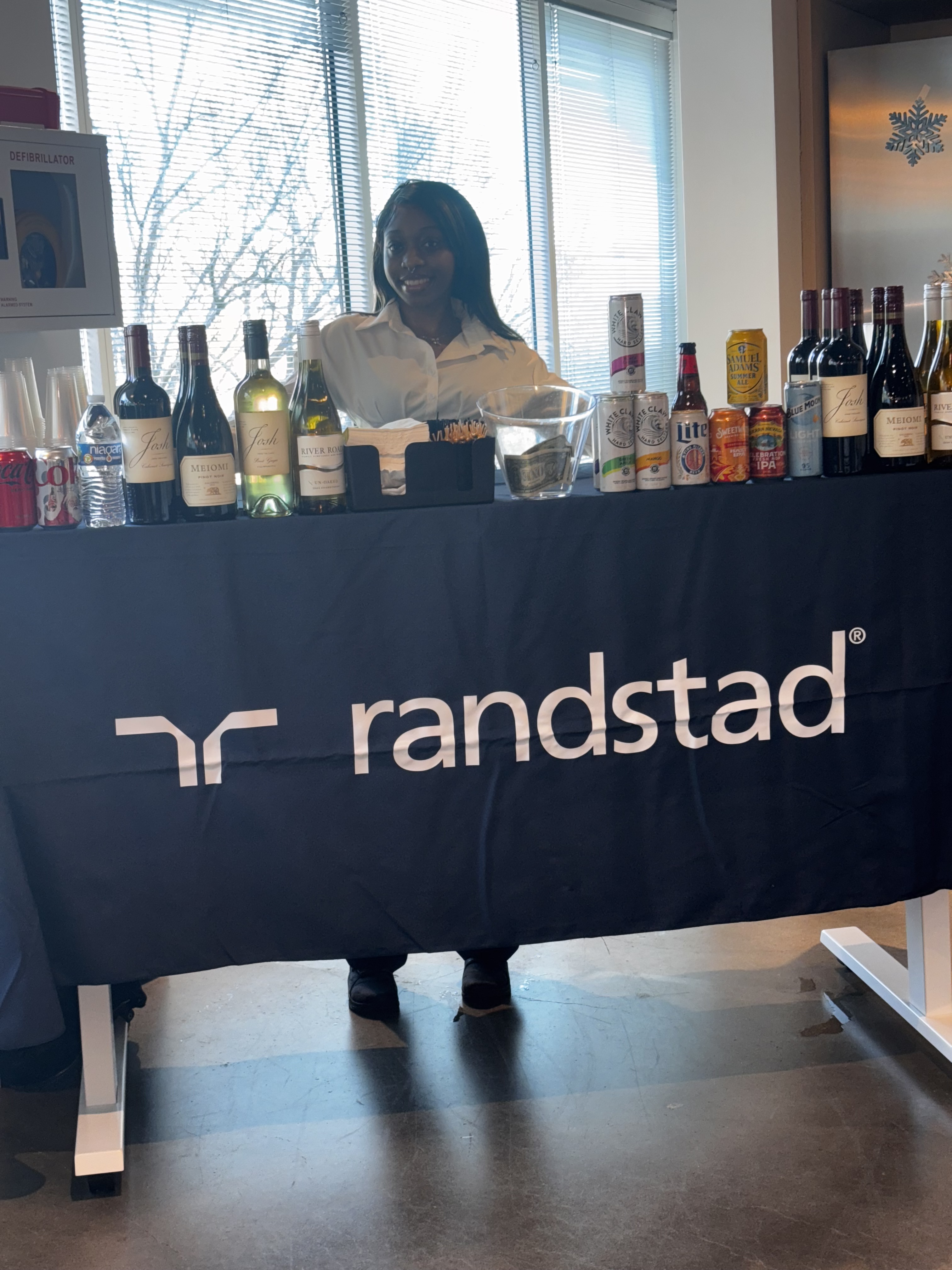 Bartender serving a corporate event bar